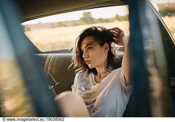 Girl free time enjoying in her car.