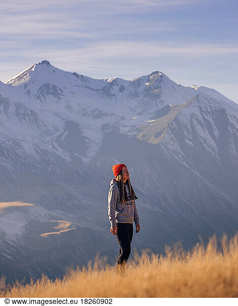 Girl in red hat portrait in mountains