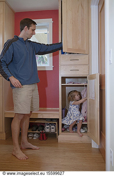 Girl playing with her father in a disability accessible home