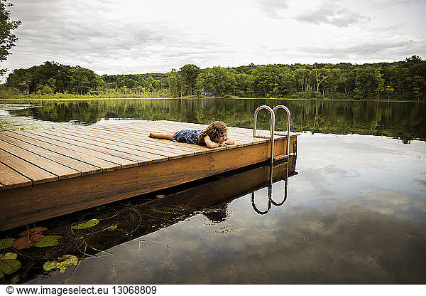 Girl relaxing on dock