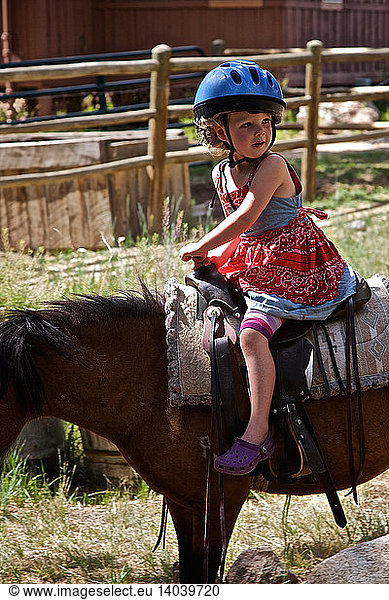 Girl Riding a Pony
