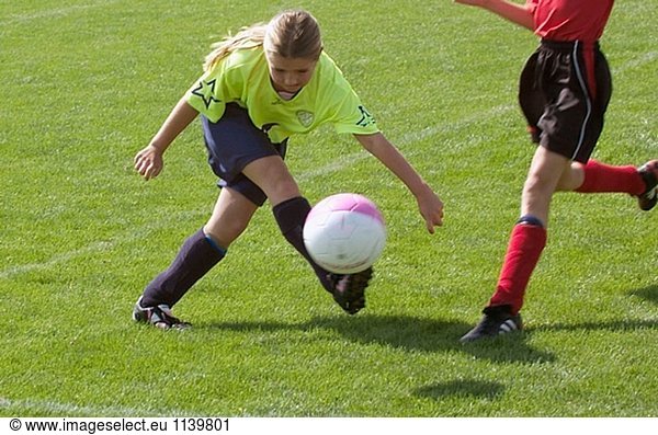 Girl´s Soccer game kick