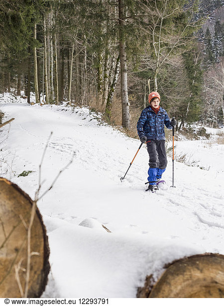 Girl snowshoeing in Black Forest  Germany  Europe
