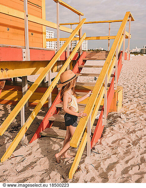 girl standing at lifeguard stand Miami beach