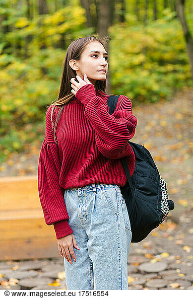 Girl travel in autumn forest