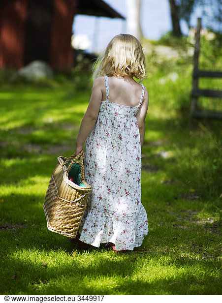 Girl walking with basket