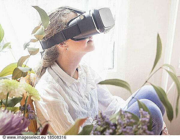 Girl wearing virtual reality glasses
