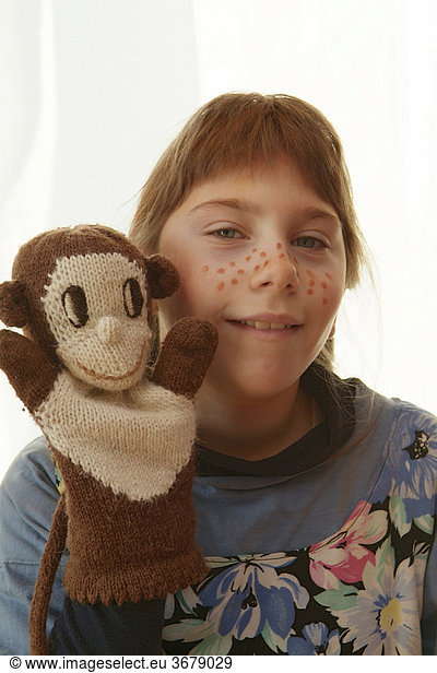 Girl with hand puppet  pippi longstockings