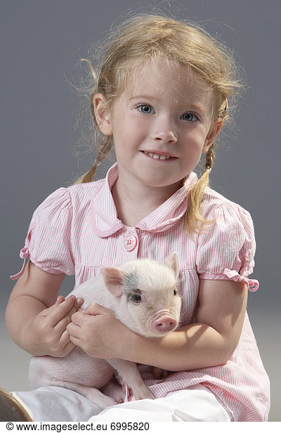 Girl with Piglet