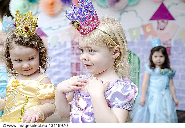 Girls in dresses during princess party