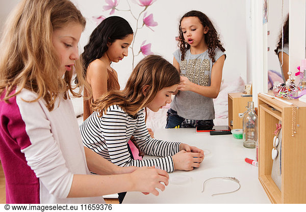 Girls playing in bedroom