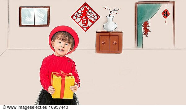 Glückliches kleines Mädchen mit dem chinesischen Neujahrsgeschenk