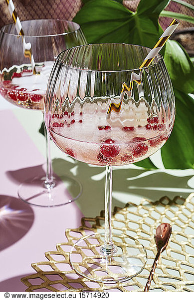 Glass of champagne with fresh berries