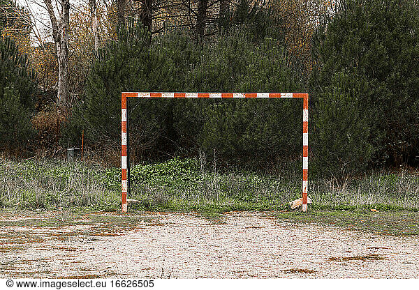 Goal on small abandoned sports field
