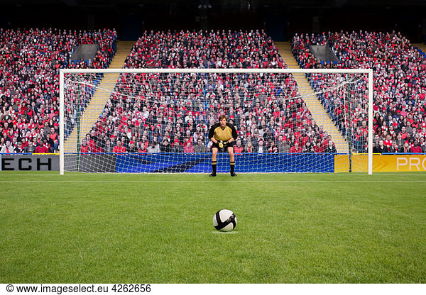 Goalkeeper and football