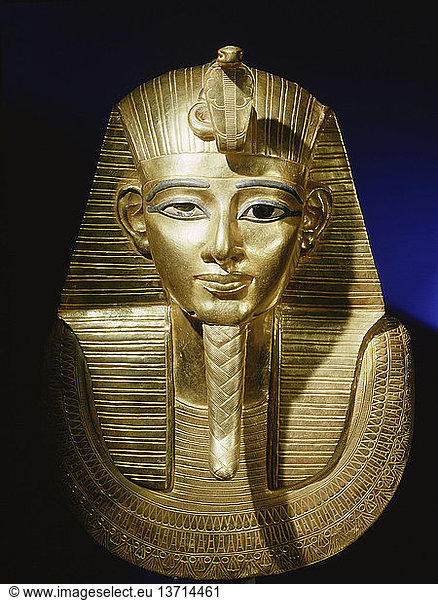 Gold funerary mask from the burial of Psusennes I  The king is shown as a young man  wearing the royal headcloth  secured by a uraeus or cobra  symbol of the protection of the sun god. Egypt. Ancient Egyptian. 21st Dynasty  1039 991 BC. Tanis.