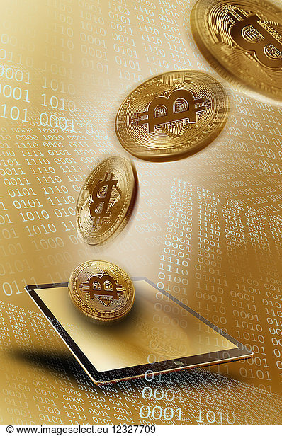 Golden Bitcoins over digital tablet