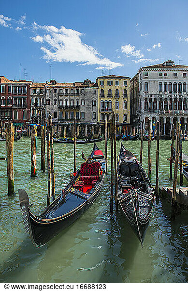 Gondolas parked at canal grande in Venice