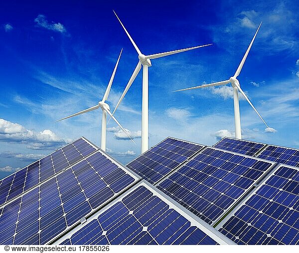 Grünes alternatives Energie- und Umweltschutz-Ökologiekonzept  Solarbatterie-Paneele und Windgenerator-Turbinen vor blauem Himmel