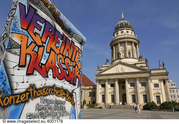 Graffiti as advertising on a piece of the Berlin Wall  French Cathedral  Gendarmenmarkt  Berlin  Germany  Europe