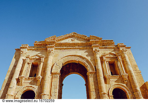 Grand arched entrance to the ancient Roman city of Jerash  Jordan