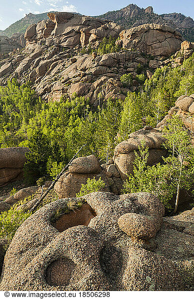 Granite rock formations with eroded potholes in Lost Creek Wilderness