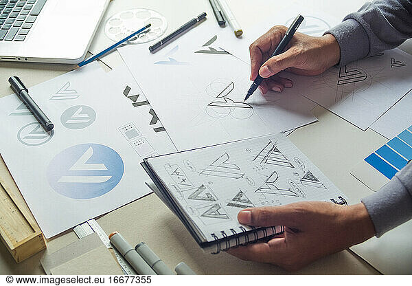 Graphic designer sketch design logo