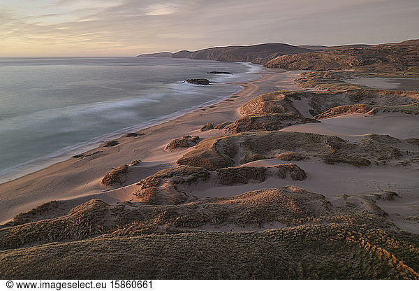 Grass sand dunes and beach at isolated Sandwood bay  Sutherland  Scotland
