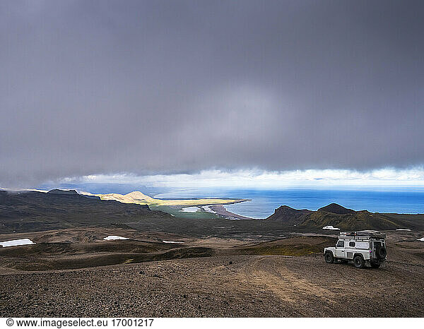 Gray clouds over off-road car in Snaefellsjokull National Park  Iceland