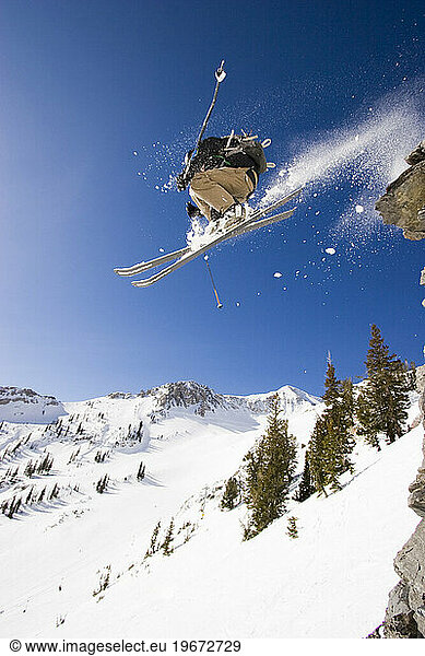 Greber Benjermin skiing off a cliff at Snowbird  Utah