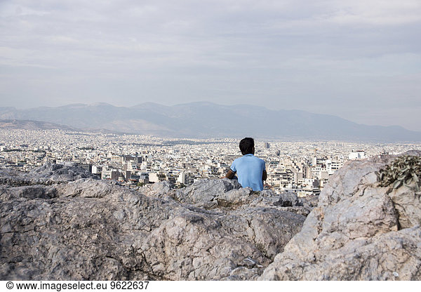 Greece  Athens  man looking on the city