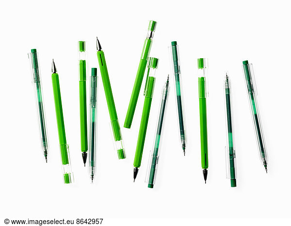 Green Office Supplies. A group of pens  blue and green colours.