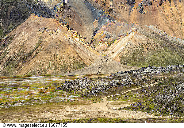 Green volcanic hills and trails in Icelandic highlands