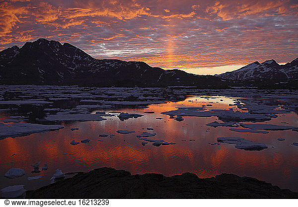 Greenland  Sunset over ice floes