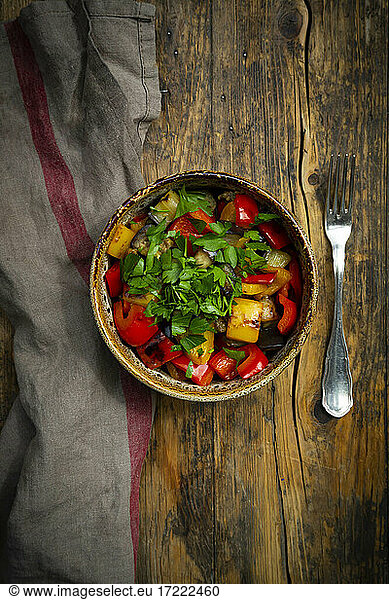 Grilled eggplant and pepper with parsley leaves