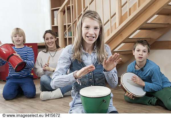 Group of drumming children