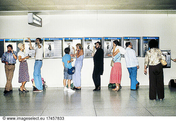 Group of People using Pay Telephones  LaGuardia Airport  Queens  New York  USA  Bernard Gotfryd  October 1981
