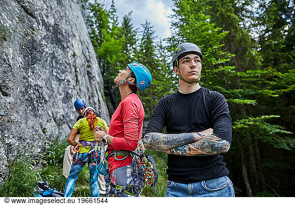 group of rock climbers preparing to climb
