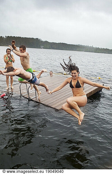 Group of twenty year olds jump into Kezar lake