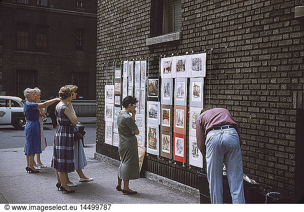 Group of Women Viewing Art from Vendor on Street Corner  New York City  New York  USA  July 1961
