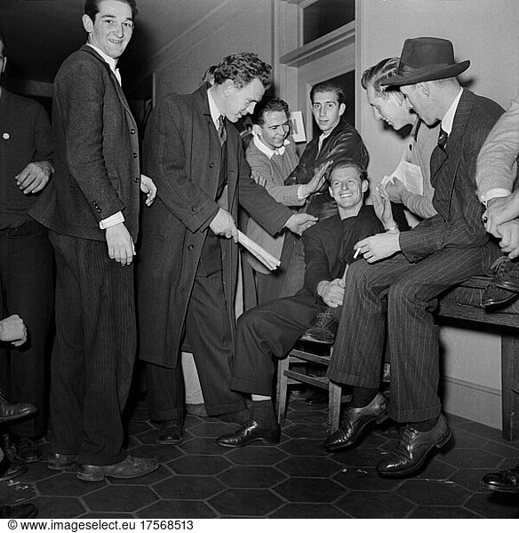 Group of Young Men waiting to Enlist at U.S. Navy Recruitment Headquarters  San Francisco  California  USA  John Collier  Jr.  U.S. Office of War Information/U.S. Farm Security Administration  December 1941
