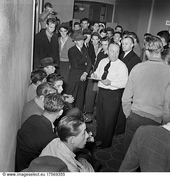 Group of Young Men waiting to Enlist at U.S. Navy Recruitment Headquarters  San Francisco  California  USA  John Collier  Jr.  U.S. Office of War Information/U.S. Farm Security Administration  December 1941