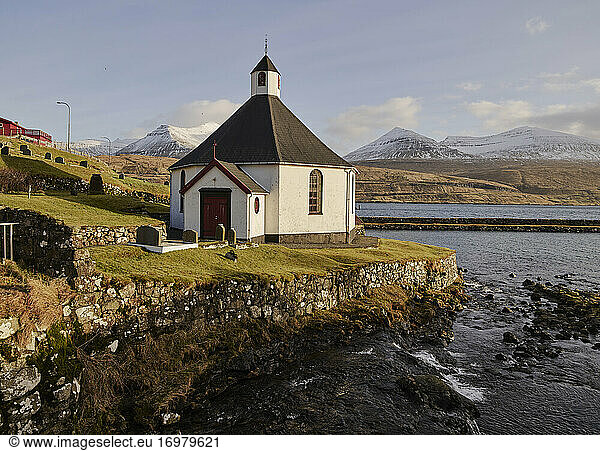 Haldarsvík church with dramatic light in the Faroe Islands
