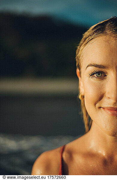 half face portrait of a beauty girl with blue eyes