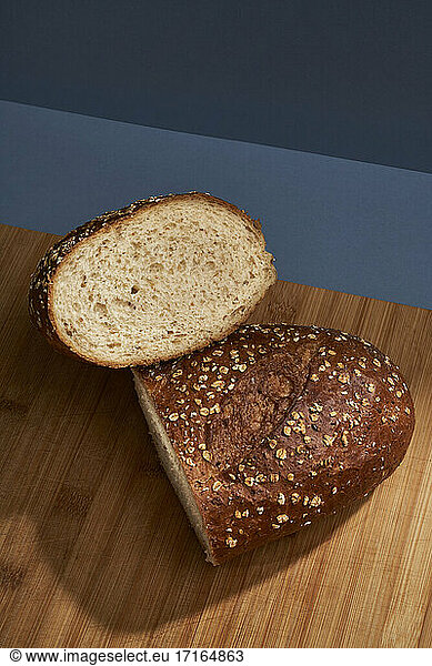 Half loaf of bread on cutting board