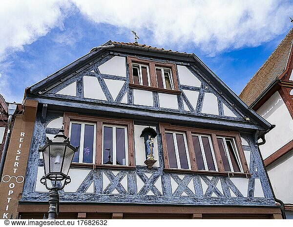 Half-timbered house with wooden figure of Mary with baby Jesus  Seligenstadt  Hesse  Germany  Europe