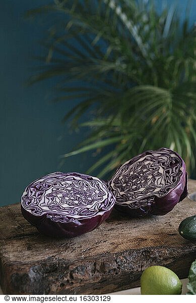Halved red cabbage on cutting board