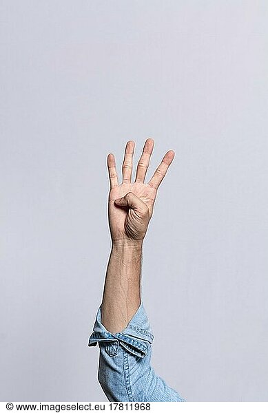 Hand counting number four  Man hand showing number four  Guy finger counting number four on isolated background