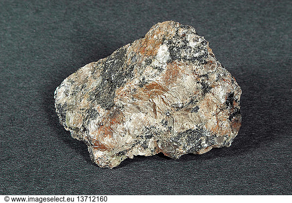 Hand Sample Of Pegmatite Hand Sample Of Pegmatite A Coarsely Grained Intrusive Igneous Rock