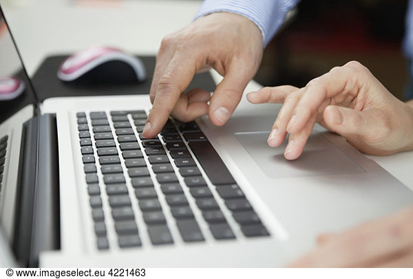 Hands above keyboard
